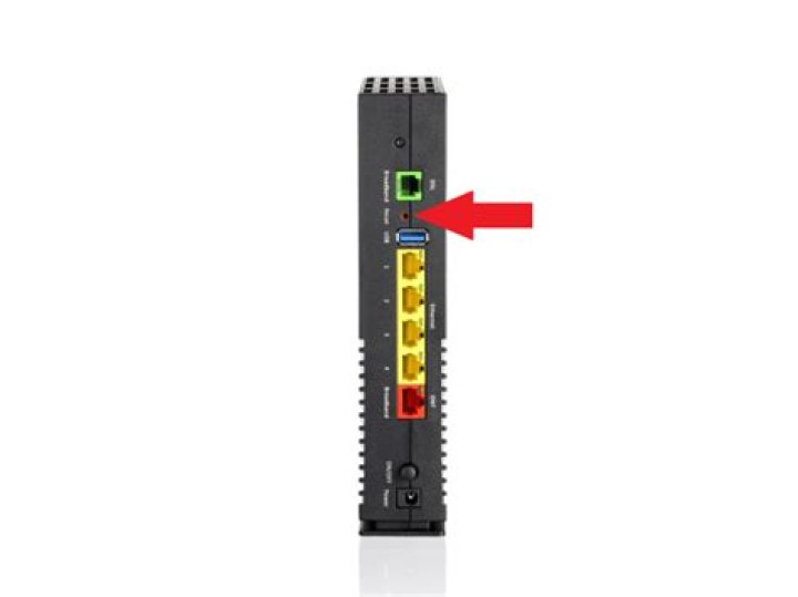 Where is the reset button on Arris sb6141?