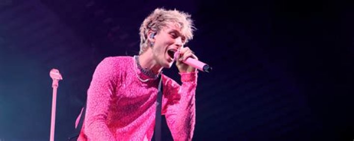 Who writes MGK songs?